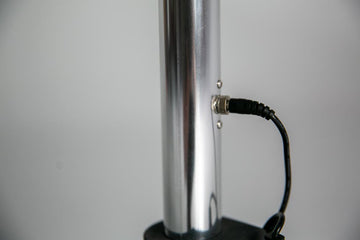 Waterproofed wire connector on Alizé fan patio umbrella pole showing outdoor-rated electrical connection
